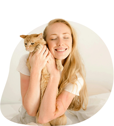 Woman lovingly holding her cat
